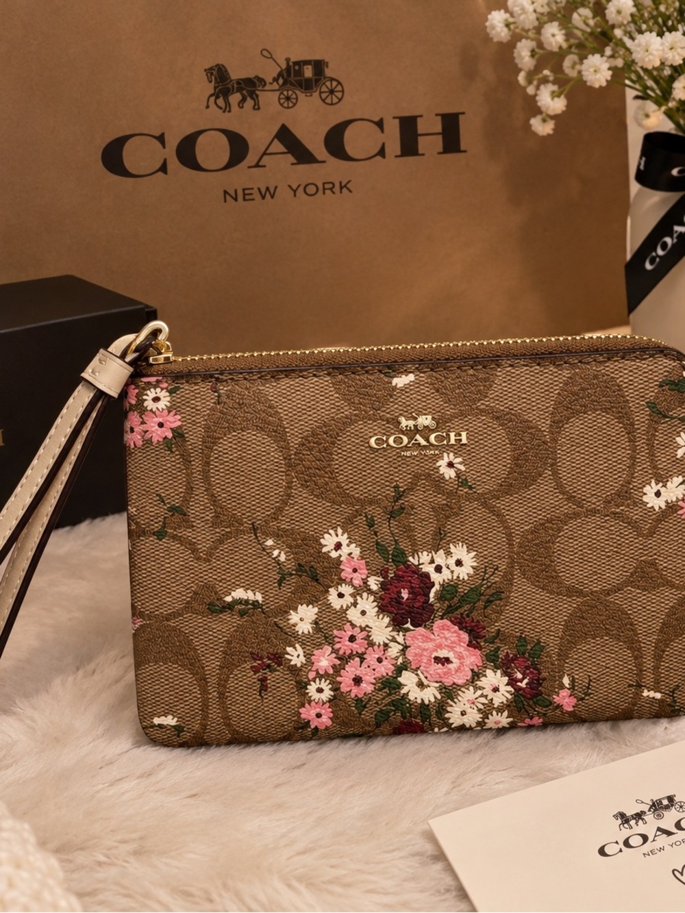 Coach Floral Signature Wristlet in Brown with Pink Accents